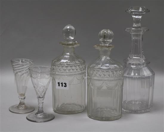 Two George III glass bottles, a Victorian decanter and two glasses